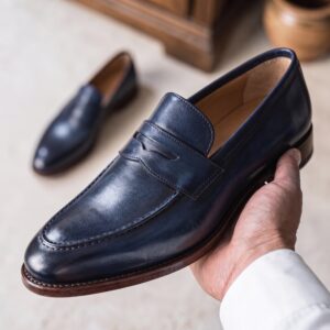 Navy blue leather penny loafers for men